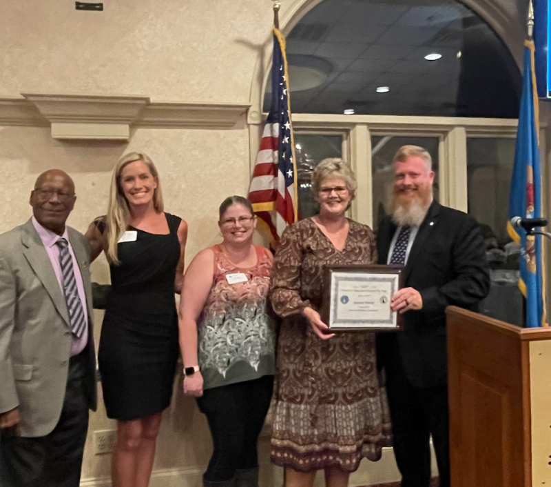 Millsboro Town Clerk Joanne Dorey, second from right, receives her award from (l-r) DLLG Vice President Archie Campbell, DMCA Vice President Ashleigh Sander, DMCA President Diana Reed and Millsboro Town Manager Jamie Burk. SUBMITTED PHOTO